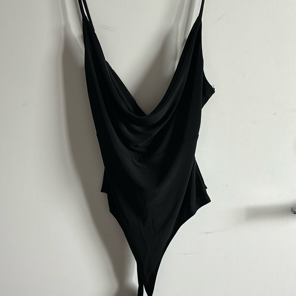 Never worn sexy cow-neck body suit